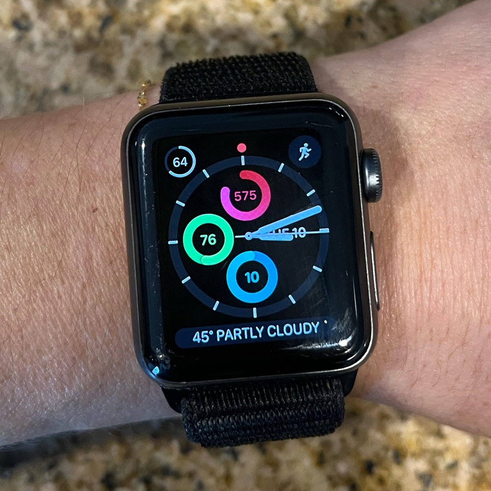 Apple Watch Series 3 with silicone and Velcro sport strap.
